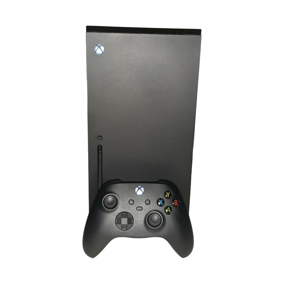 Xbox Series X console with a black wireless controller, angled, controller beside it