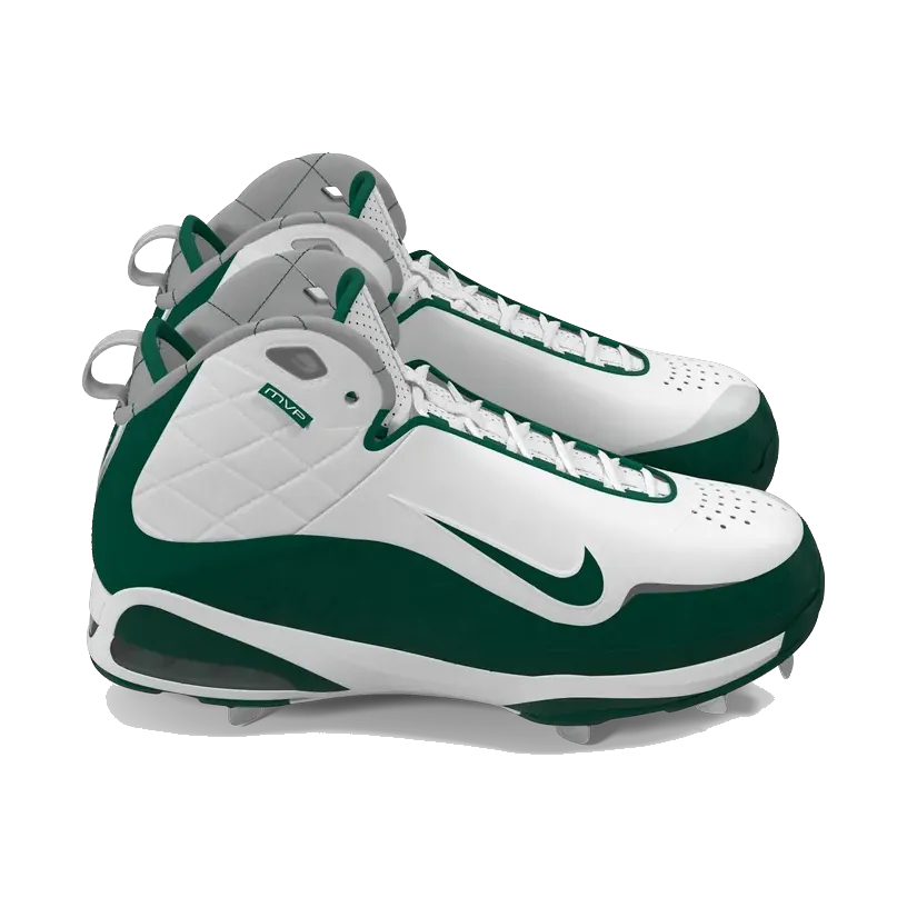 Nike Alpha Huarache baseball cleats in white and green, pair at an angle