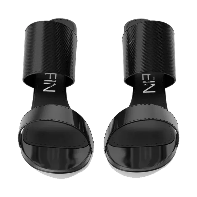Calvin Klein black heeled mules with logo strap, pair from the front