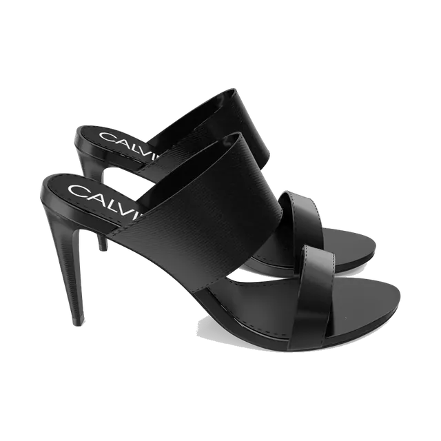 Calvin Klein black heeled mules with logo strap, pair at an angle
