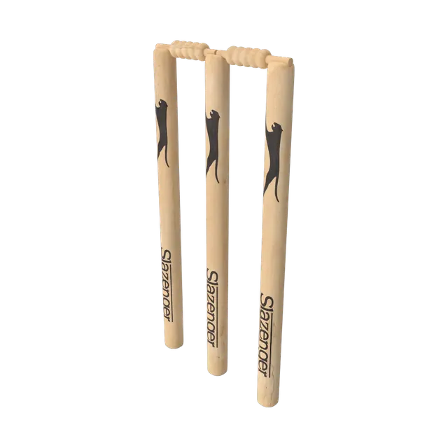 Three Slazenger wooden cricket stumps with bails